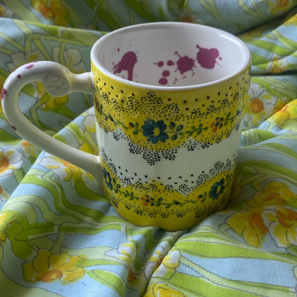 Anthropologie Comedy of Manners Yellow Scalloped mug, red interior splatter